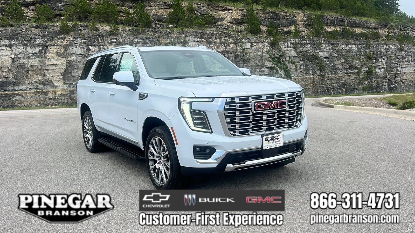 2026 GMC Yukon Denali in Glacier White Tricoat — front three-quarter view
