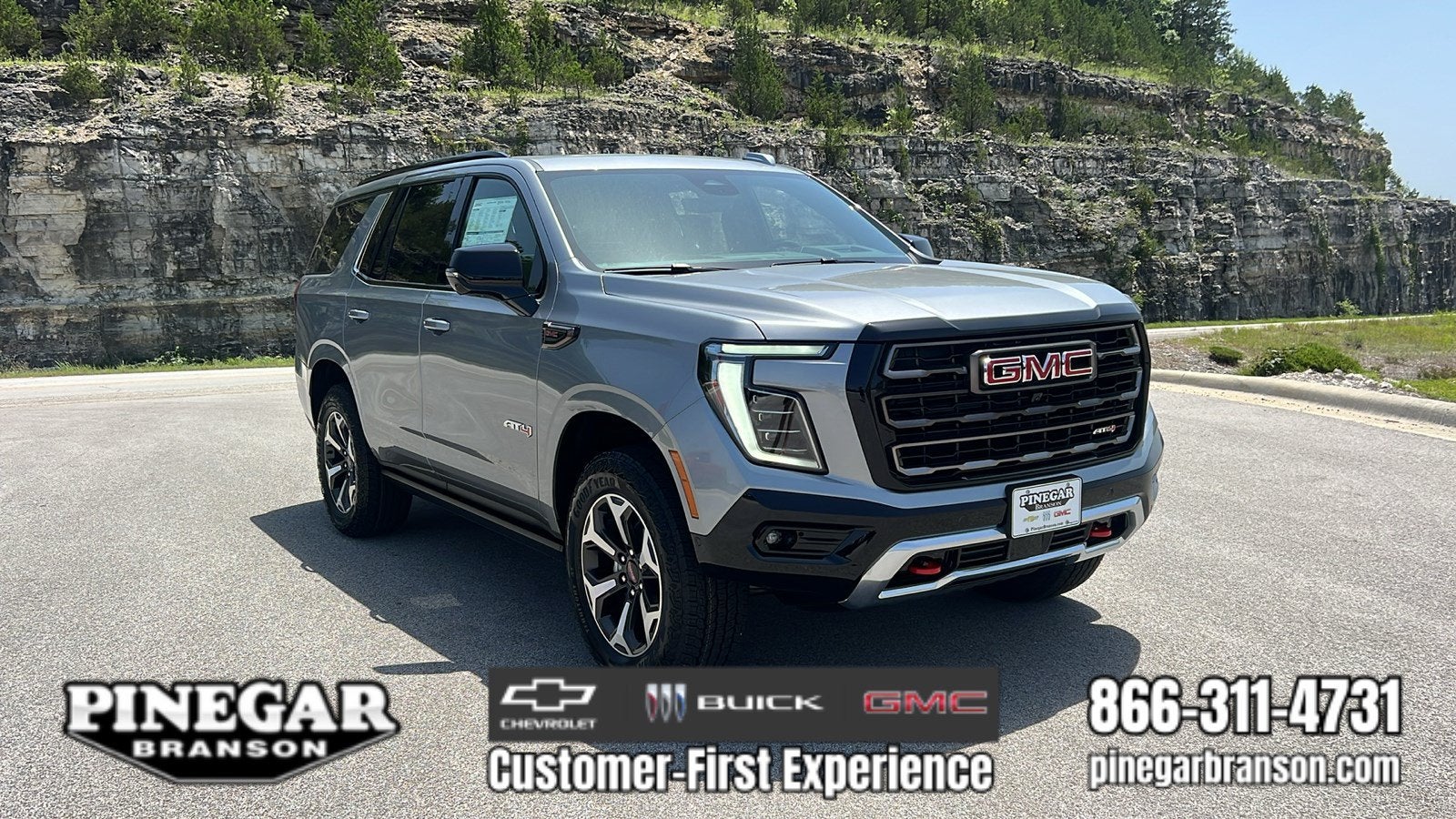 2026 GMC Yukon AT4 Ultimate in Sterling Metallic — front three-quarter view