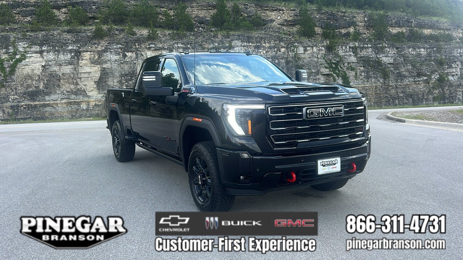 2026 GMC Sierra 2500 HD AT4 in Onyx Black — front three-quarter view