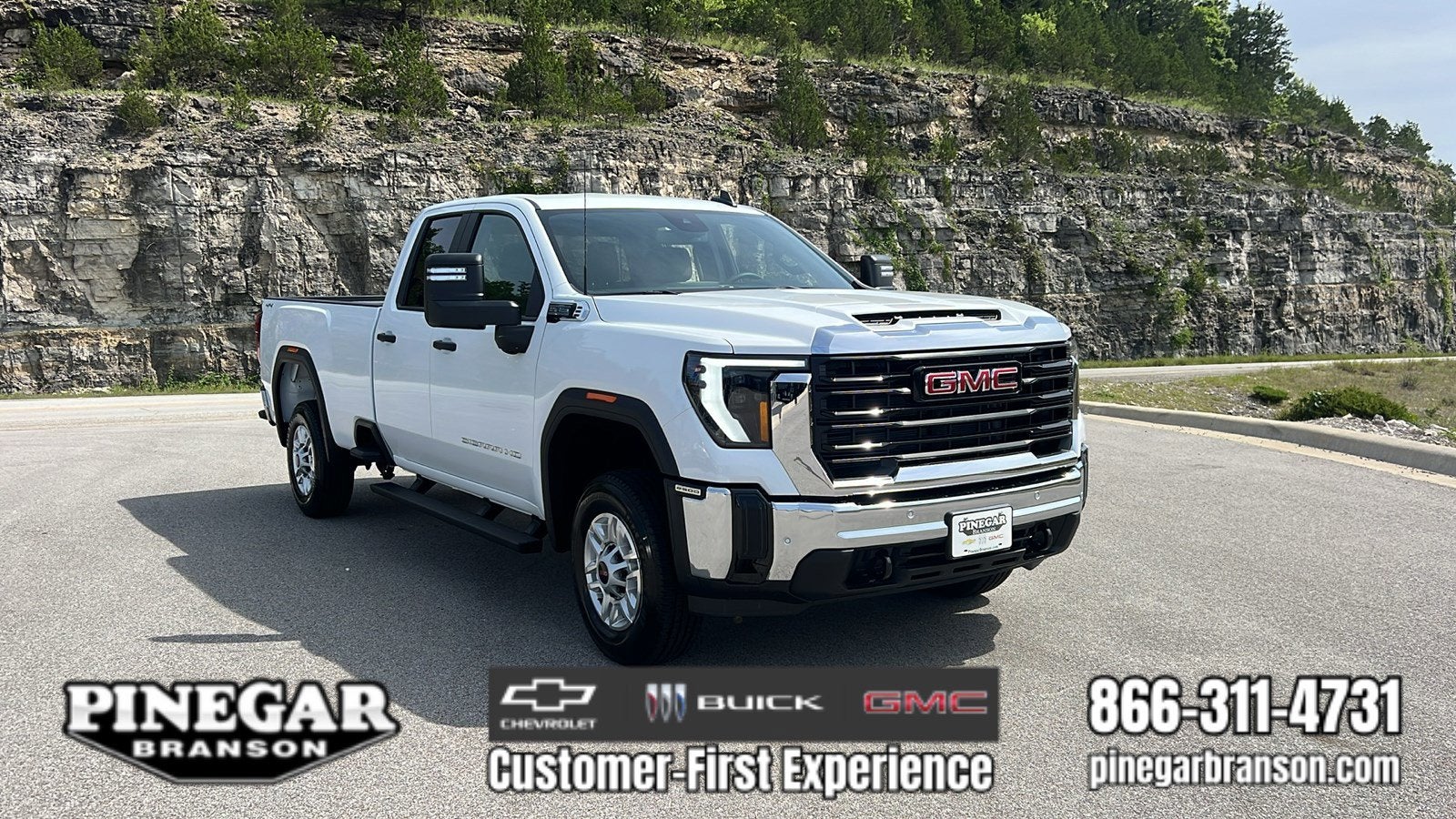 2026 GMC Sierra 2500 HD Pro in Summit White — front three-quarter view
