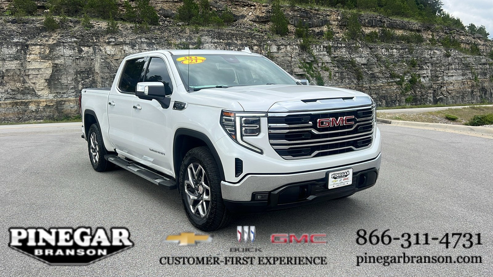 2023 GMC Sierra 1500 SLT in White Frost Tricoat — front three-quarter view
