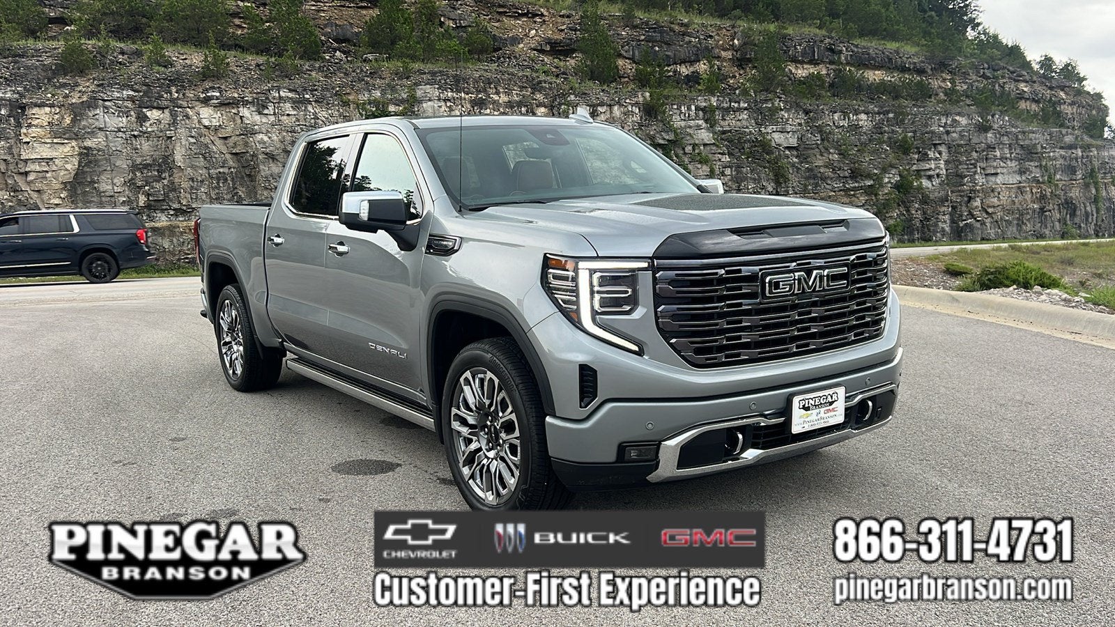 2026 GMC Sierra 1500 Denali Ultimate in Sterling Metallic — front three-quarter view