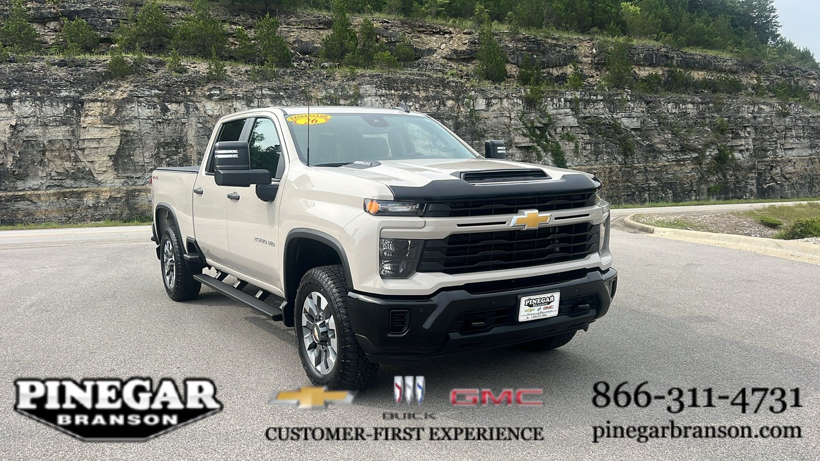 2026 Chevrolet Silverado 2500 HD Custom in White Sands — front three-quarter view
