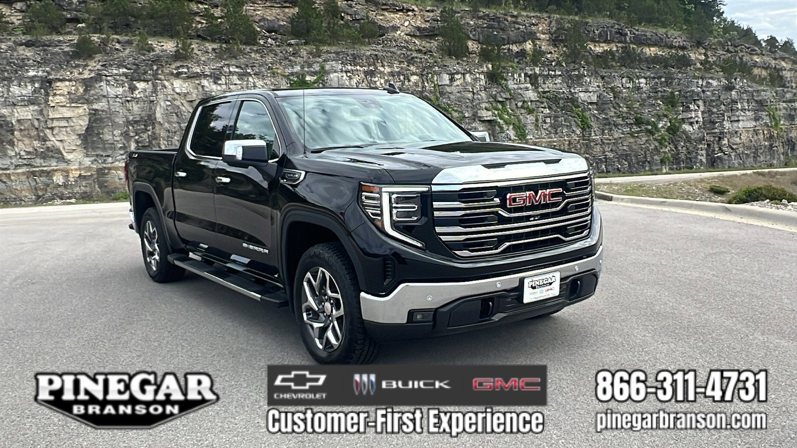 2026 GMC Sierra 1500 SLT in Onyx Black — front three-quarter view