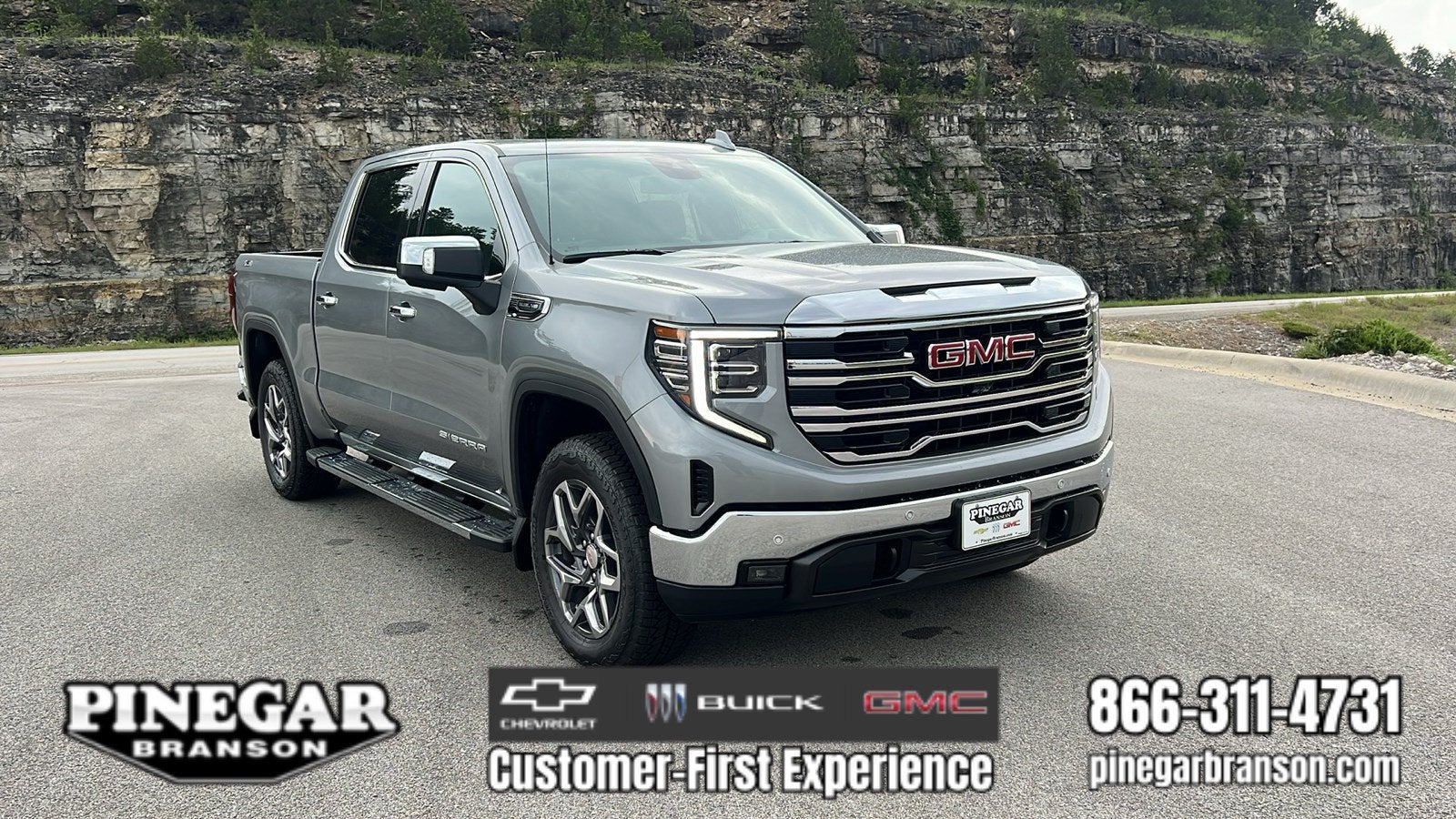 2026 GMC Sierra 1500 SLT in Sterling Metallic — front three-quarter view