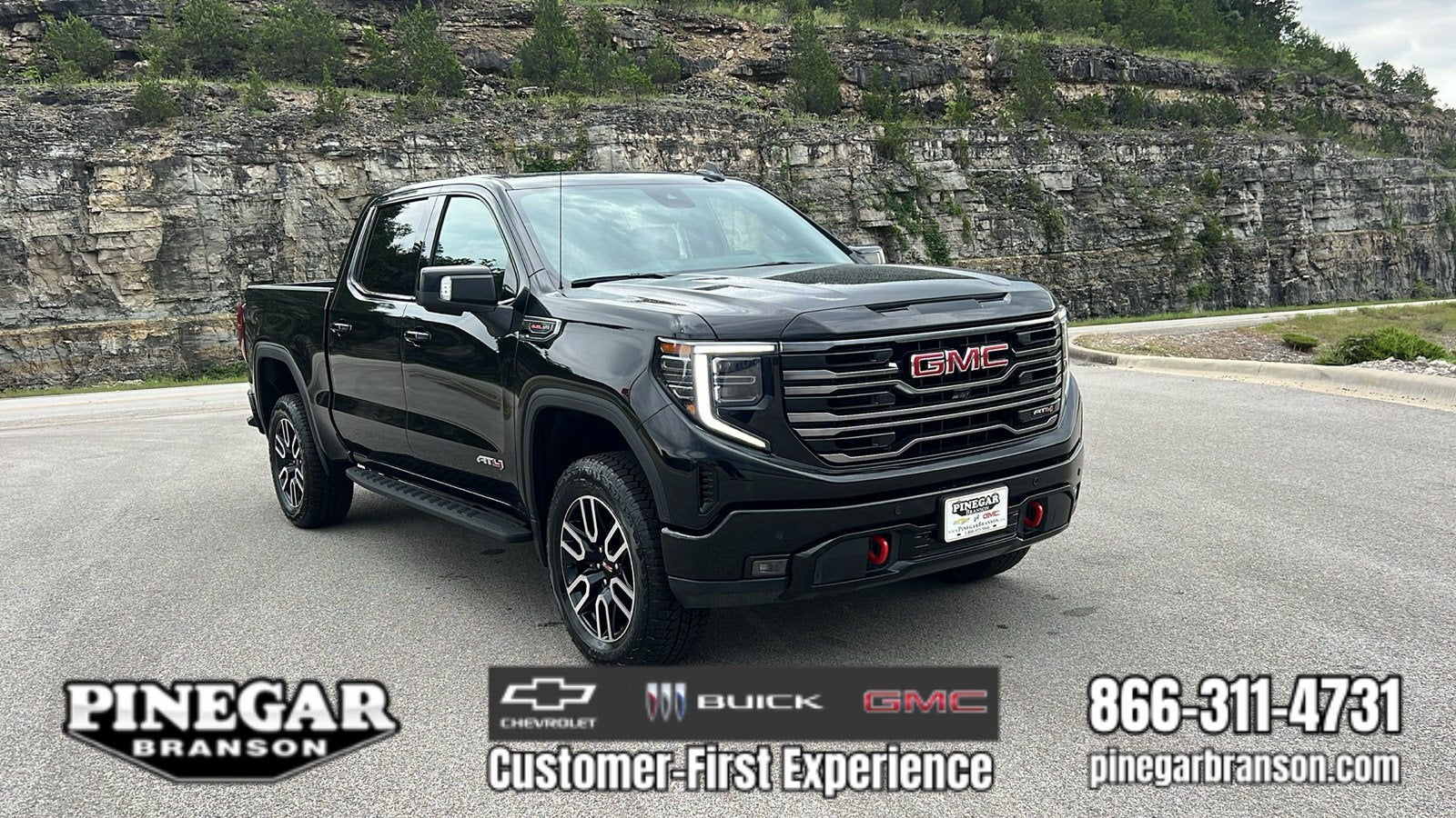 2026 GMC Sierra 1500 AT4 in Onyx Black — front three-quarter view