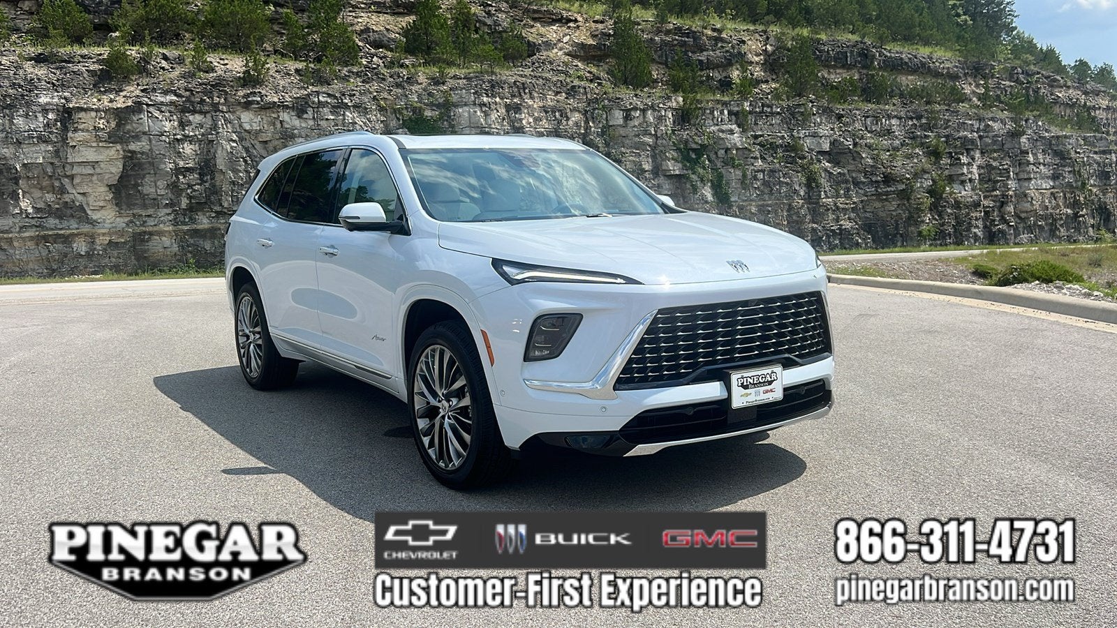 2026 Buick Enclave Avenir in Iridescent White Tricoat — front three-quarter view