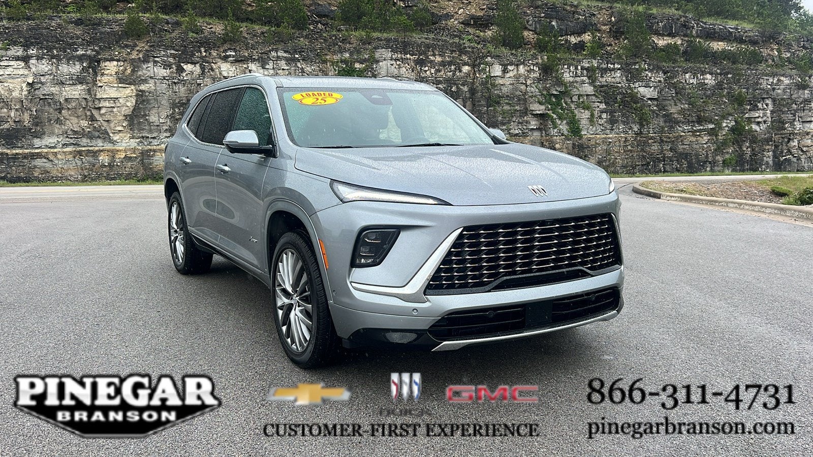 2025 Buick Enclave Avenir in Moonstone Gray Metallic — front three-quarter view